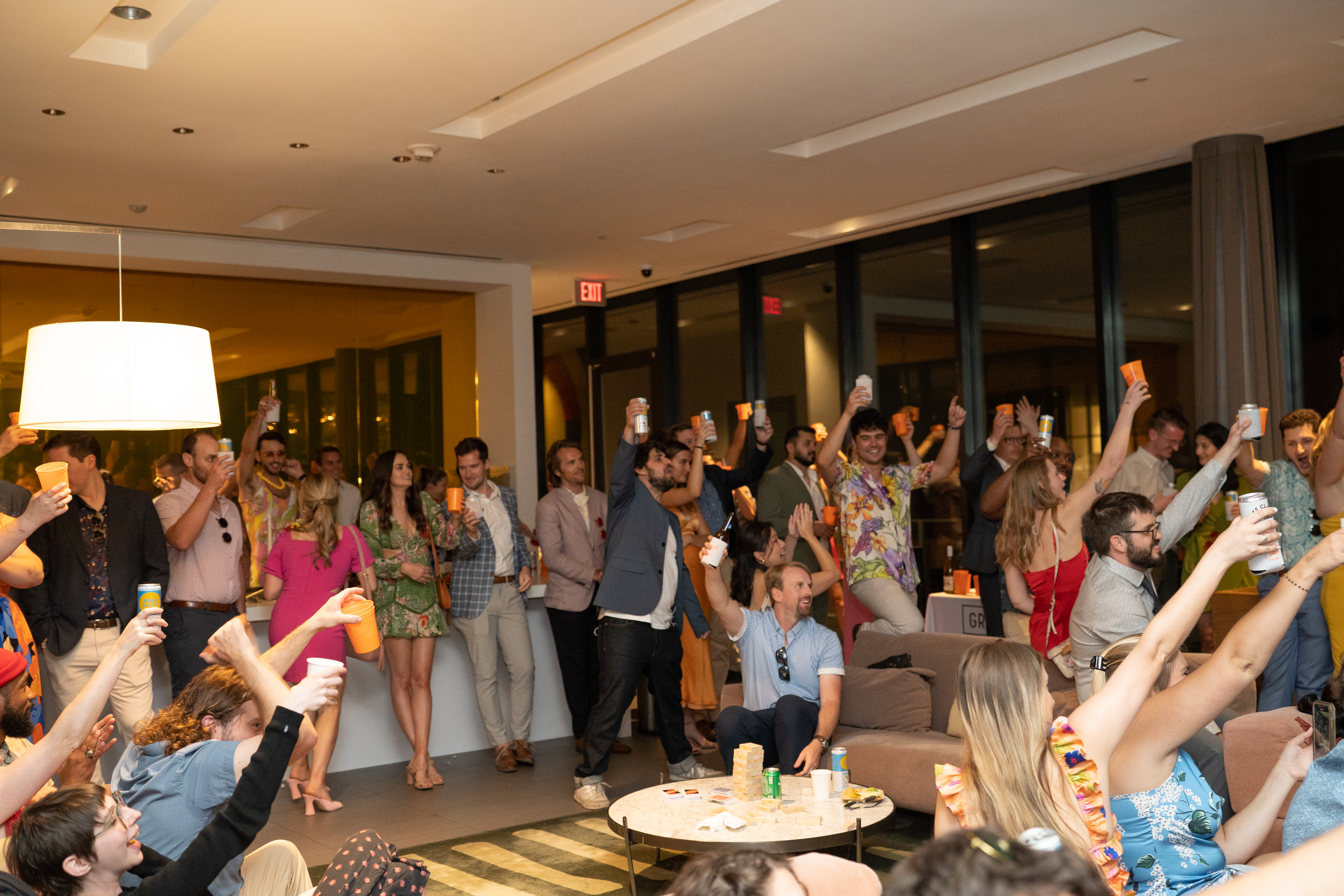 Everyone raising their drinks for the big toast