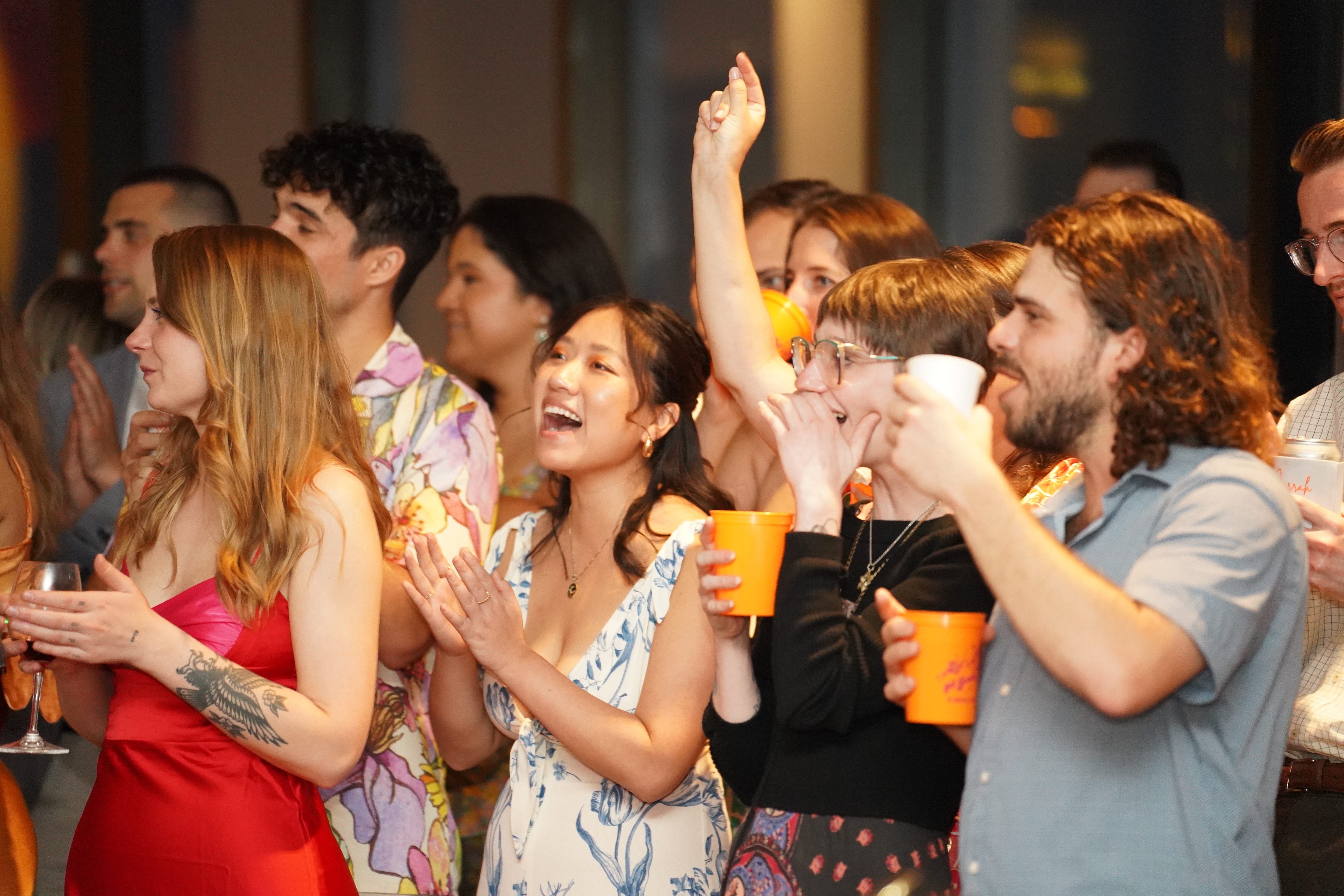 Crowd cheering and clapping